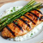 grilled chicken with rice and cooked asparagus